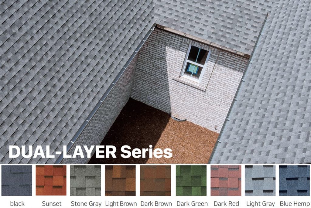 Grey roof shingles from dual layer series installed on a house