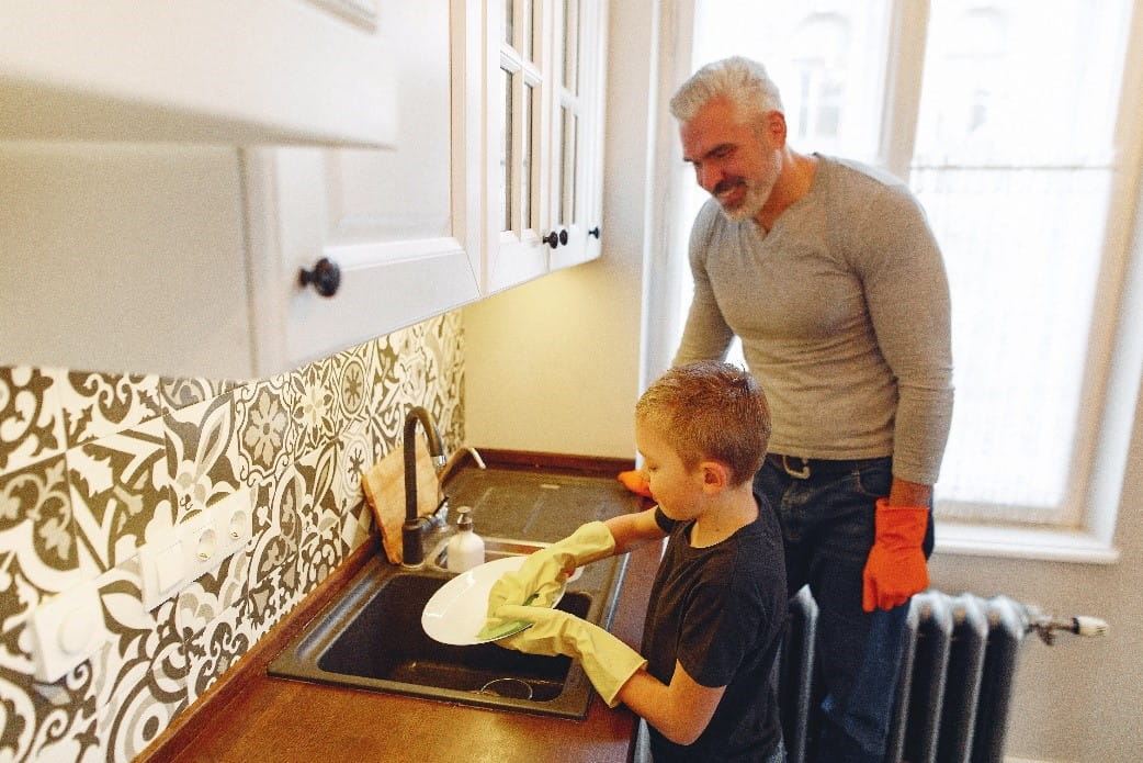 Kitchen sink with child